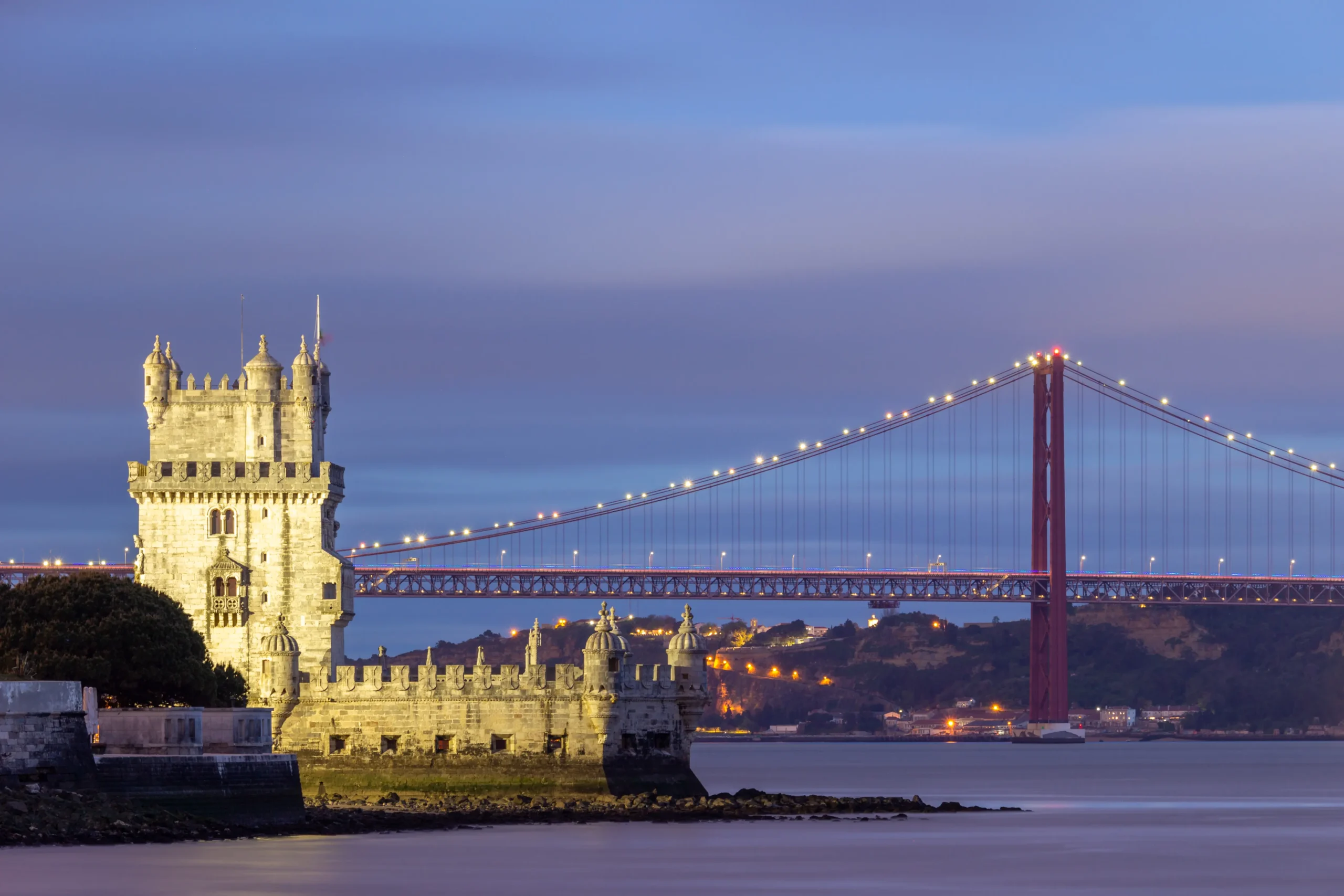 belem-tower-and-25th-of-april-bridge-at-evening-tw-2026-01-11-10-51-31-utc